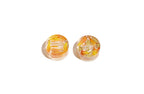 Two Mini Circle Ring Stands with wedding flowers preserved in clear resin.