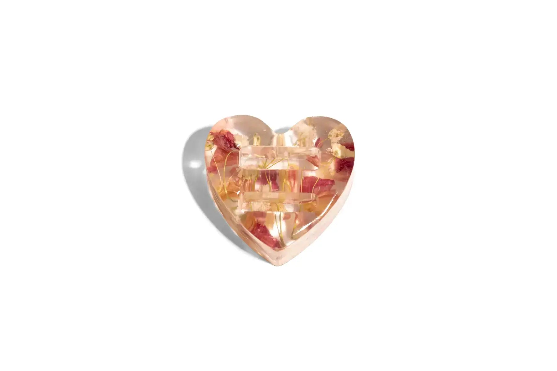 Mini Heart Ring Stand with the ability to fit two rings, made with pink resin flowers.