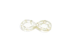 Infinity shaped ring dish made with clear resin featuring white wedding flowers.
