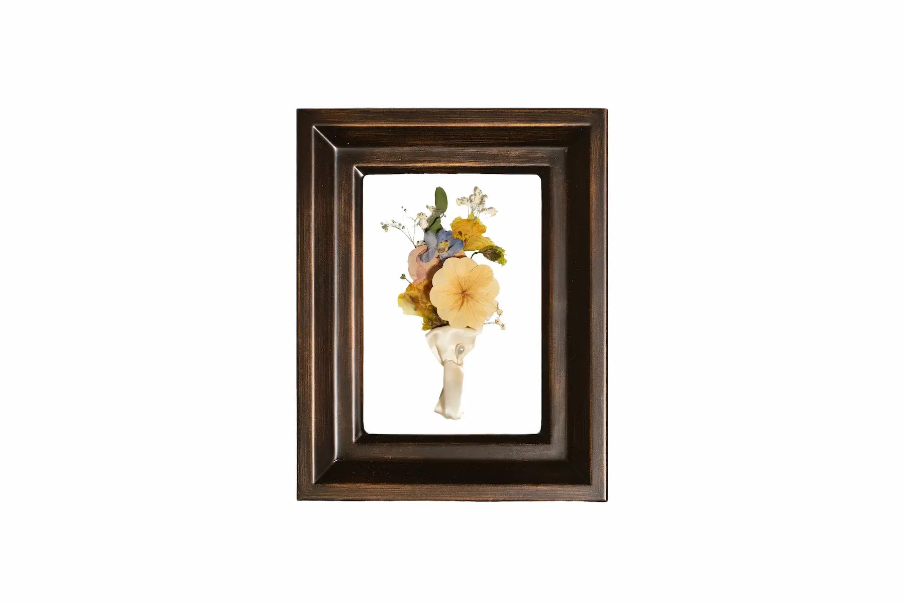 Rubbed Bronze wooden frame displays groom boutonniere with floral arrangement.