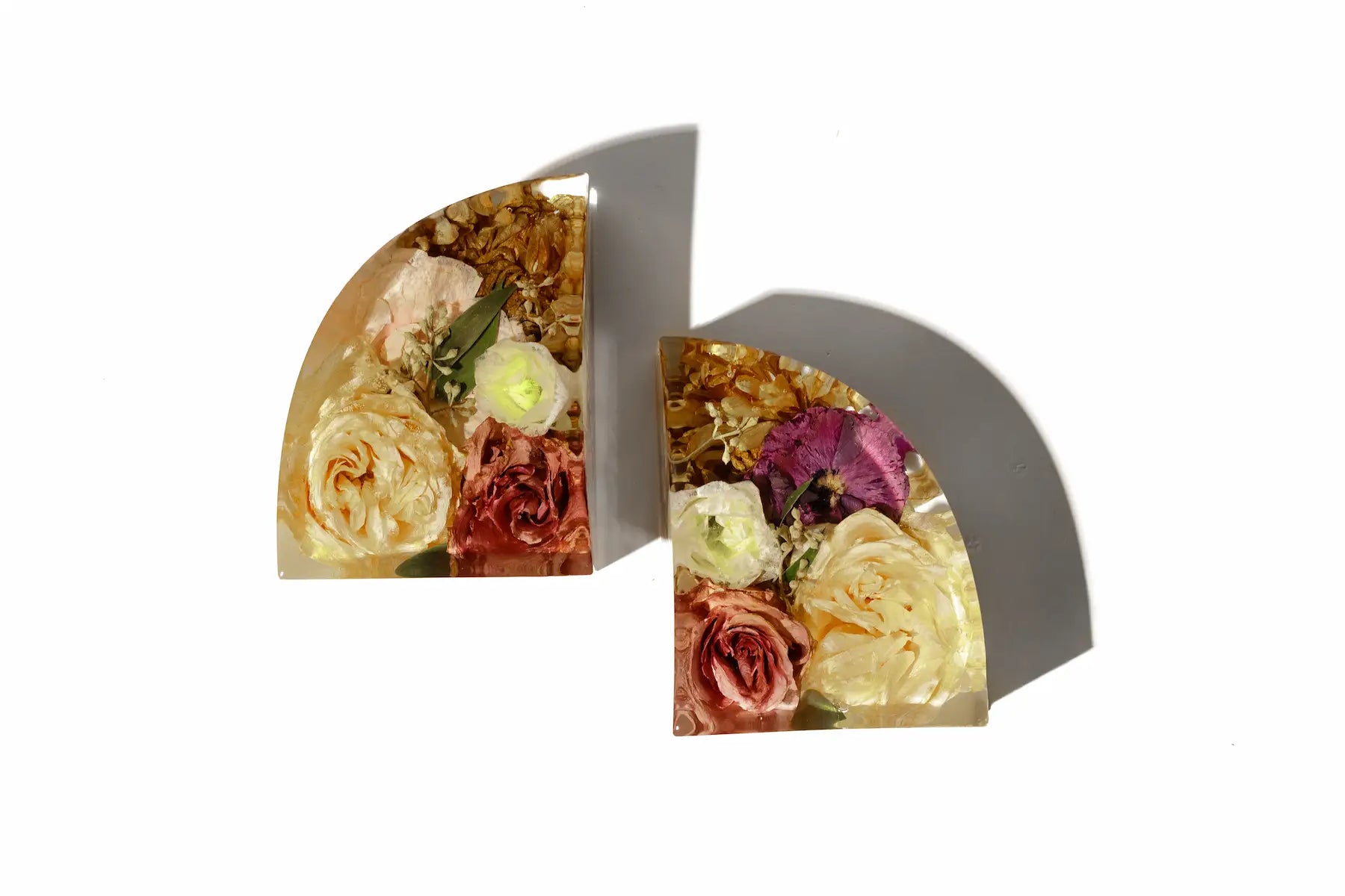 Large resin bookends with beautiful preserved wedding bouquet 