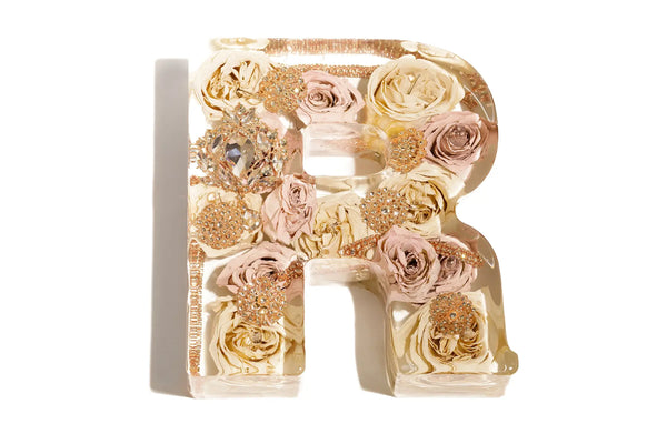 Decorative letter 'R' with pink roses wedding flowers preserved with resin