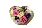 A heart shaped clear resin block displaying roses in a 7x8 inch size.