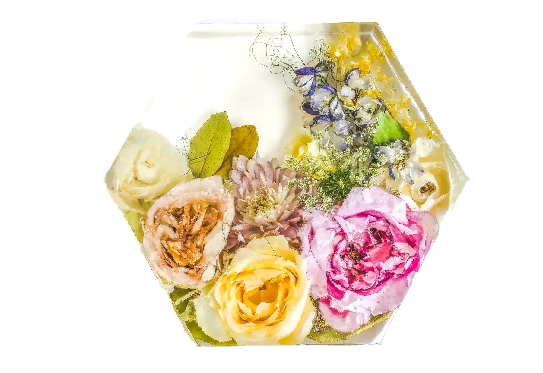 A hexagon shaped resin bouquet block 8x9x3 inch in size featuring a bright bouquet of wedding florals.