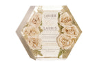 A large 11 inch hexagon bouquet block made of resin, preserving a wedding invitation surrounded by pink roses.