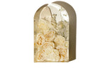 A medium resin block in an arch shape featuring a custom arrangement of white roses and ranunculus from the bottom edge moving upwards.