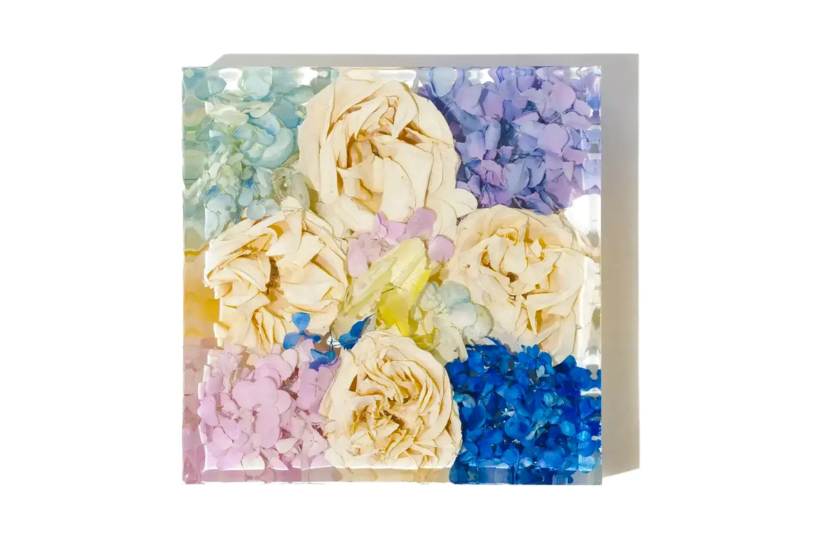 An 8 inch medium bouquet block featuring resin preserved roses, carnations, and hydrangea.