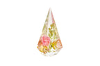 Preserved pink wedding flowers presented in a resin ring holder.
