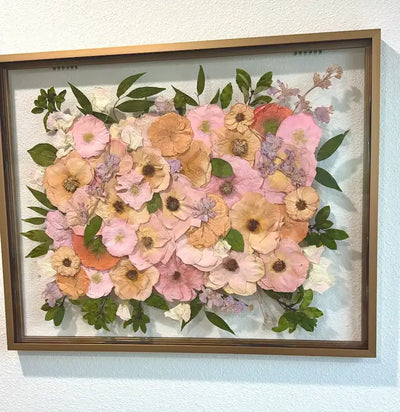 pressed wedding bouquet with roses and greenery in 16x20 brown wood frame