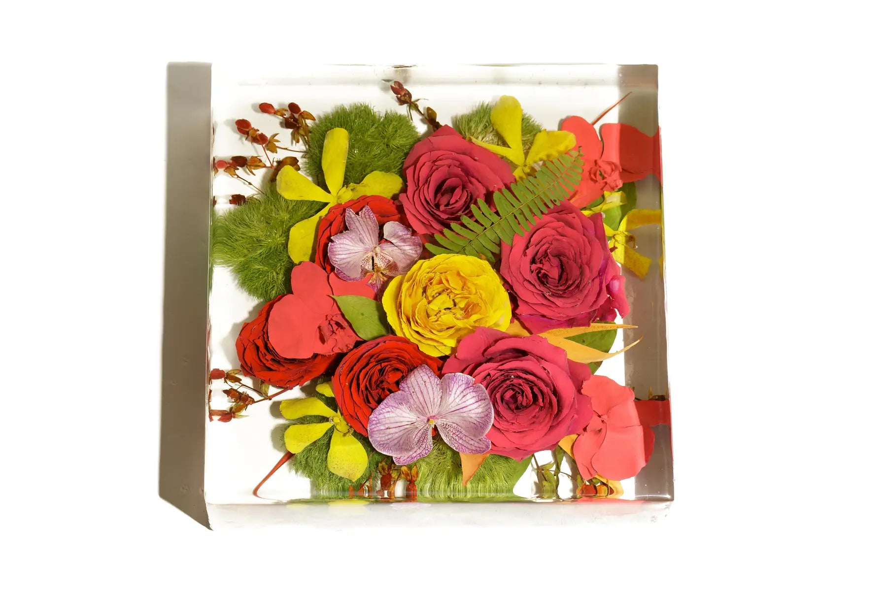 A large 10 inch square bouquet block featuring a wedding bouquet of red roses preserved in resin.