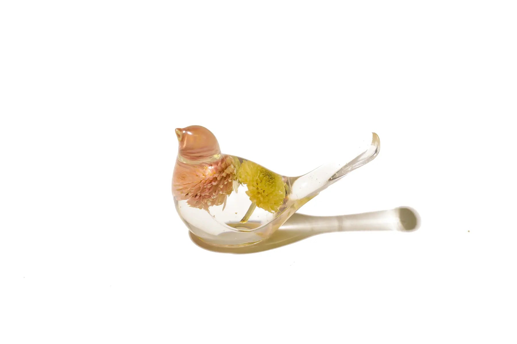 Resin bird featuring bridal bouquet preservation in a small animal figurine