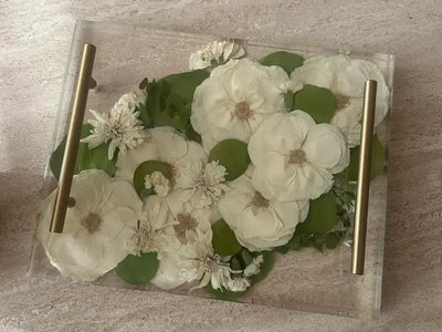 Resin tray with preserved wedding flowers in decorative tray with handles