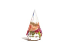 Teardrop-shaped resin ring holder with preserved peachy floral arrangement.