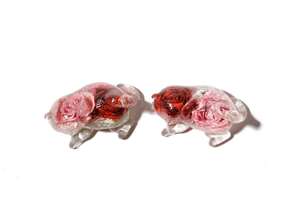 Matching pair of side sleeping cat resin figurines with preservation of pink and red roses
