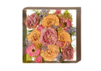 An 8 inch square resin bouquet block with custom vinyl lettering and preserved wedding flowers.