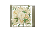 White dahlia and tea roses in a medium size resin bouquet block.