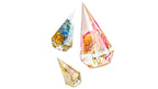 Three decorative resin ring holders shaped like teardrops with preserved wedding flowers