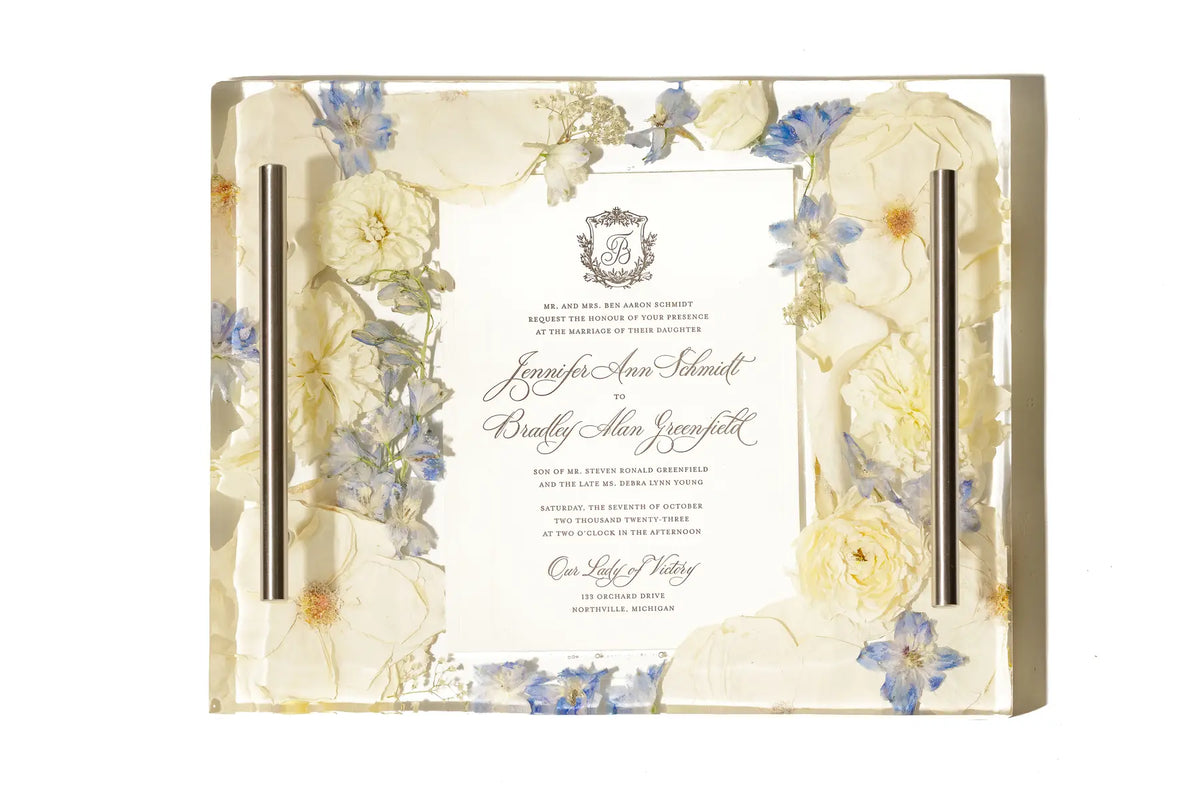 An 8x11 inch resin serving tray featuring a preserved wedding invitation surrounded by a bouquet of bridal flowers.