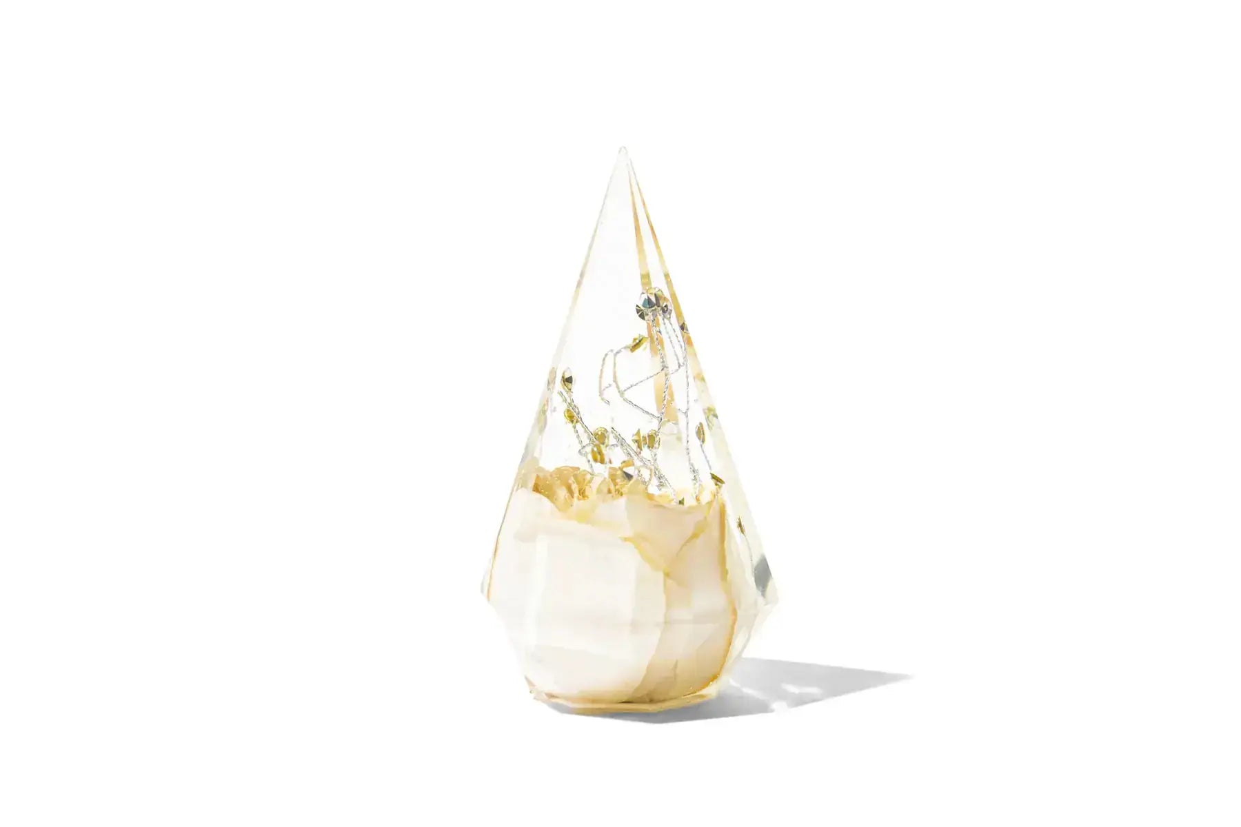 Resin ring holder with preserved white single flower in a tear shaped design.